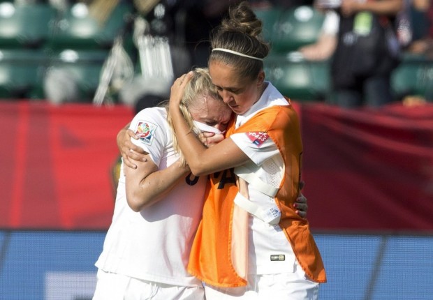 Pain: Laura Bassett in tears after her own goal heartbreak