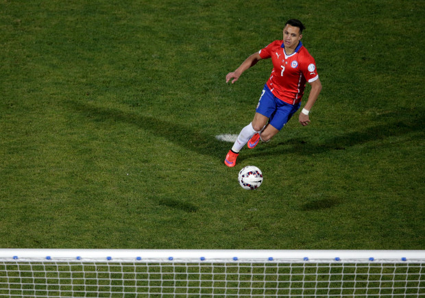 History: Sanchez clips home the clinching penalty (Photo by Ricardo Moraes / Action Images)