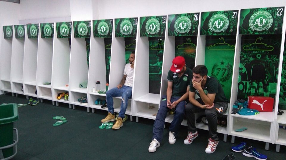 Chapecoense players who didn't travel to Colombia pictured in the club's changing room upon hearing the news